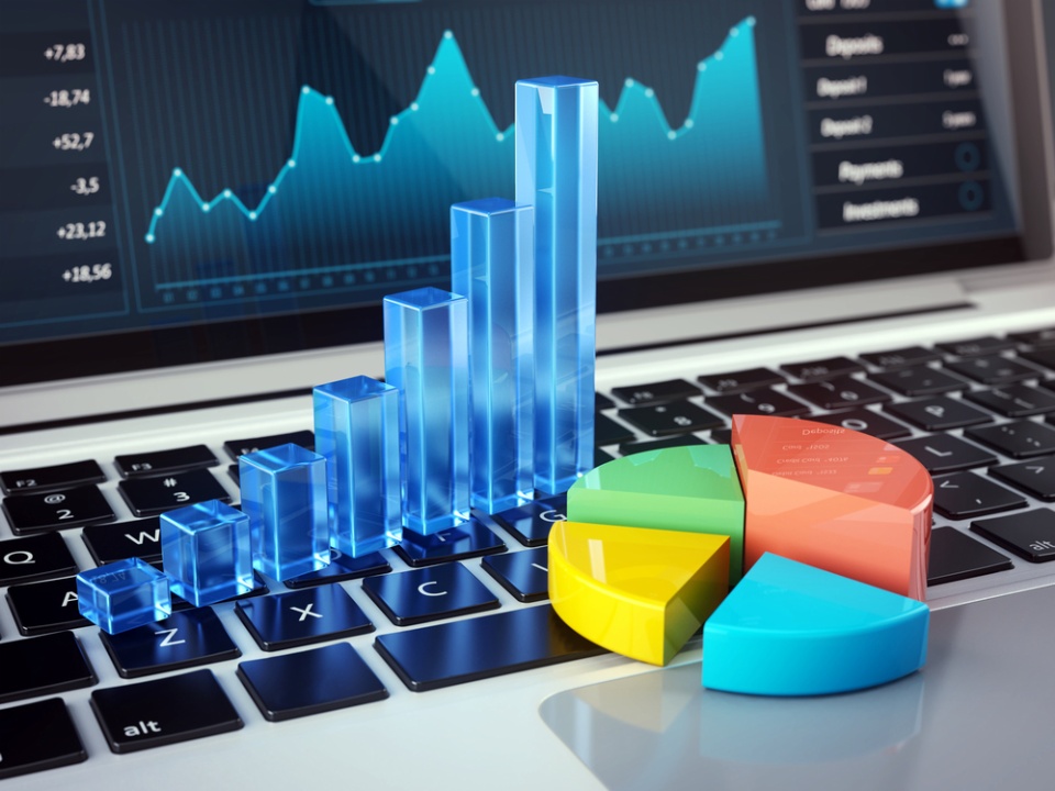 graphs on laptop keyboard